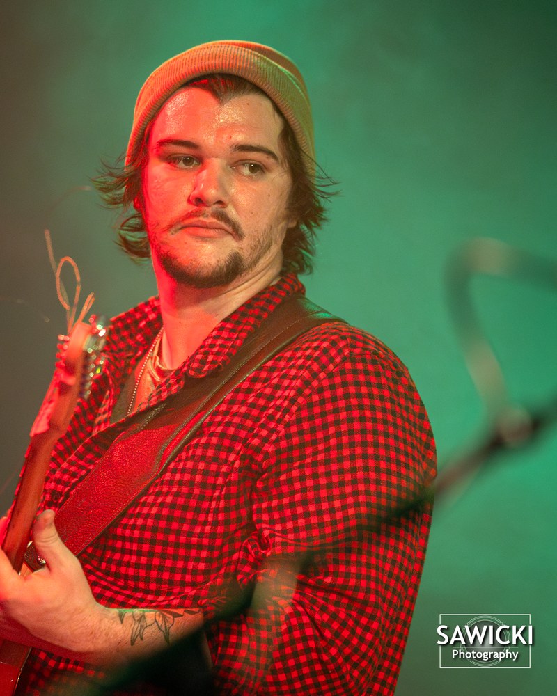 Kyle Hackett live at Positive Libations, red flannel and beanie